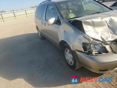 Zdjęcie 14 z 15 samochodu: 2002 TOYOTA SIENNA LE VIN:4T3ZF13C52U427433 - miniatura