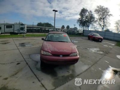 Zdjęcie 13 z 13 samochodu: 2000 CHEVROLET GEO PRIZM BASE VIN:1Y1SK5281YZ421313 - miniatura