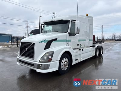 2012 Volvo Vnl 2012 Volvo VNL 6x4 T/A Sleeper Truck Tractor 4V4NC9EH1CN552196 - główne zdjęcie licytacji z USA - miniatura