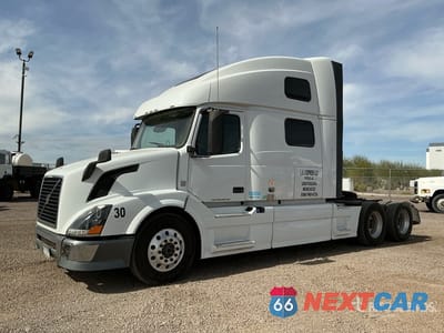 2015 Volvo Vnl 2015 Volvo VNL 6x4 T/A Sleeper Truck Tractor 4V4NC9EH8FN914724 - główne zdjęcie licytacji z USA - miniatura