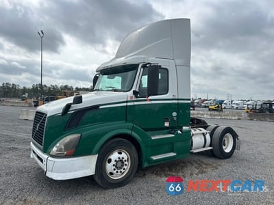 2012 Volvo Vnl 2012 Volvo VNL 4x2 S/A Day Cab Truck Tractor 4V4N19TH6CN554339 - główne zdjęcie licytacji z USA - miniatura