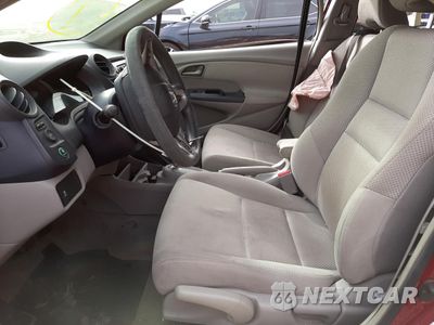 Piąte zdjęcie samochodu w środku: 2010 HONDA INSIGHT EX VIN:JHMZE2H78AS030471 - miniatura