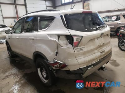 Trzecie zdjęcie samochodu z tyłu: 2017 FORD ESCAPE SE VIN:1FMCU9G90HUA43313 - miniatura