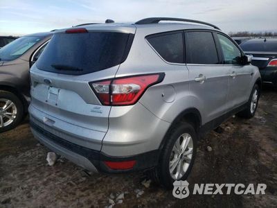 Czwarte zdjęcie samochodu z boku: 2018 FORD ESCAPE SE VIN:1FMCU0GD6JUA81330 - miniatura
