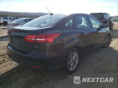 Czwarte zdjęcie samochodu z boku: 2018 FORD FOCUS SE VIN:1FADP3F29JL326330 - miniatura