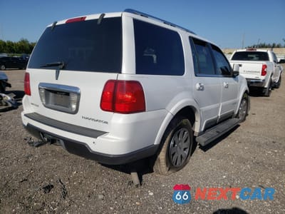 Czwarte zdjęcie samochodu z boku: 2004 LINCOLN NAVIGATOR VIN:5LMFU27R94LJ23856 - miniatura