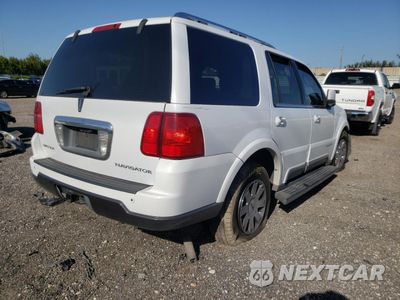 Czwarte zdjęcie samochodu z boku: 2004 LINCOLN NAVIGATOR VIN:5LMFU27R94LJ23856 - miniatura