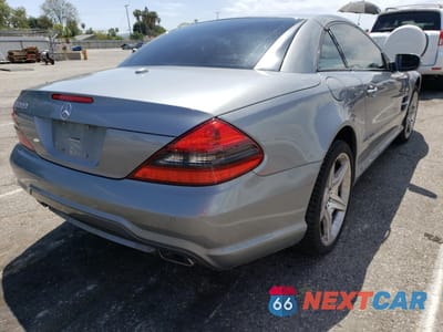 Czwarte zdjęcie samochodu z boku: 2011 MERCEDES-BENZ SL 550 VIN:WDBSK7BA3BF163936 - miniatura