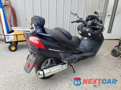 Czwarte zdjęcie samochodu z boku: 2004 SUZUKI AN400 K3 VIN:JS1CK43AX32101326 - miniatura