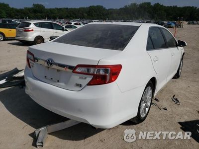 Czwarte zdjęcie samochodu z boku: 2012 TOYOTA CAMRY HYBRID VIN:4T1BD1FK8CU010506 - miniatura