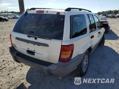 Czwarte zdjęcie samochodu z boku: 2004 JEEP GRAND CHEROKEE LAREDO VIN:1J4GX48SX4C423612 - miniatura
