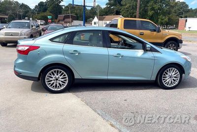Zdjęcie 6 z 13 samochodu: 2012 FORD FOCUS SEL VIN:1FAHP3H20CL209740 - miniatura