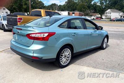 Piąte zdjęcie samochodu w środku: 2012 FORD FOCUS SEL VIN:1FAHP3H20CL209740 - miniatura