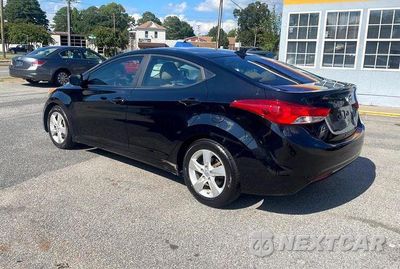 Trzecie zdjęcie samochodu z tyłu: 2012 HYUNDAI ELANTRA GLS VIN:5NPDH4AE2CH068853 - miniatura