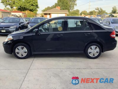 Piąte zdjęcie samochodu w środku: 2009 NISSAN VERSA S VIN:3N1BC11E89L392292 - miniatura