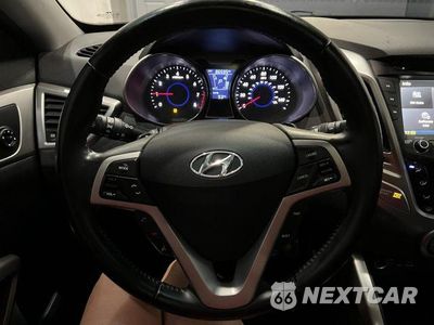 Zdjęcie 16 z 27 samochodu: 2014 HYUNDAI VELOSTER VIN:KMHTC6AD6EU183232 - miniatura