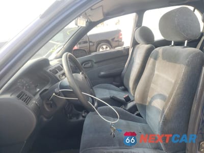 Piąte zdjęcie samochodu w środku: 1996 TOYOTA COROLLA DX VIN:2T1BA05E1TC114142 - miniatura