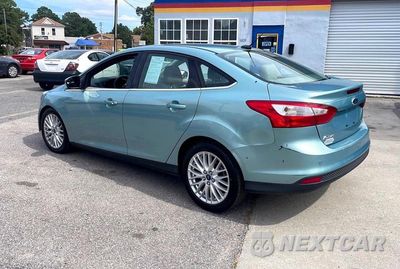 Trzecie zdjęcie samochodu z tyłu: 2012 FORD FOCUS SEL VIN:1FAHP3H20CL209740 - miniatura
