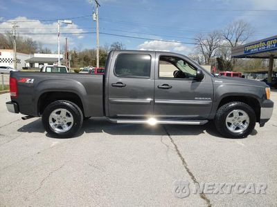 Zdjęcie 7 z 16 samochodu: 2010 GMC SIERRA K1500 SLT VIN:3GTRKWE37AG276910 - miniatura