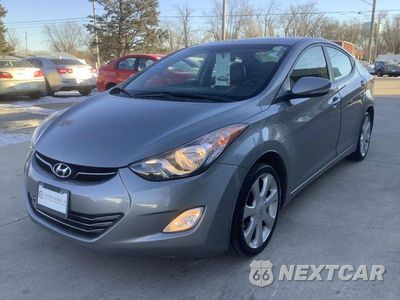 Czwarte zdjęcie samochodu z boku: 2011 HYUNDAI ELANTRA GLS VIN:KMHDH4AE3BU165849 - miniatura