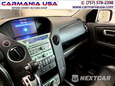 Zdjęcie 24 z 30 samochodu: 2011 HONDA PILOT TOURING VIN:5FNYF3H97BB031322 - miniatura