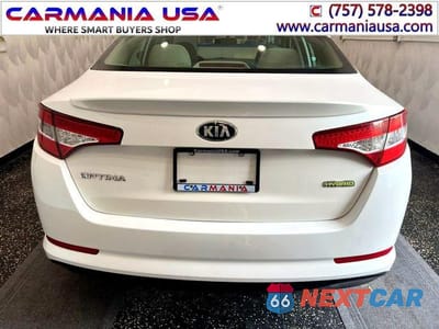 Zdjęcie 7 z 30 samochodu: 2013 KIA OPTIMA HYBRID VIN:KNAGM4AD9D5057038 - miniatura