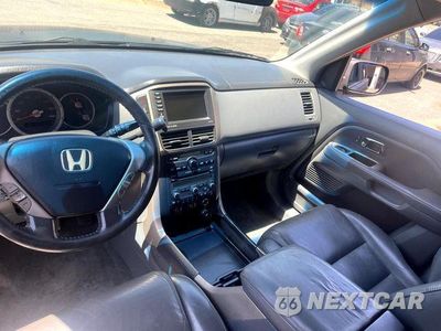Zdjęcie 12 z 16 samochodu: 2006 HONDA PILOT EX VIN:2HKYF18746H546028 - miniatura