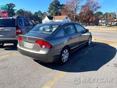 Trzecie zdjęcie samochodu z tyłu: 2006 HONDA CIVIC LX VIN:1HGFA16566L077657 - miniatura