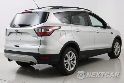 Piąte zdjęcie samochodu w środku: 2017 FORD ESCAPE SE VIN:1FMCU9G94HUA89436 - miniatura