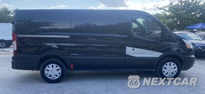 Czwarte zdjęcie samochodu z boku: 2015 FORD TRANSIT T-150 VIN:1FTNE1YMXFKA60367 - miniatura