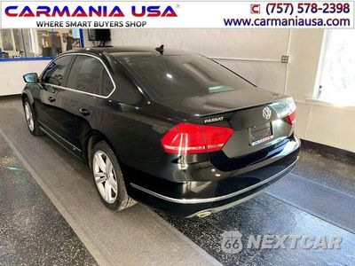 Czwarte zdjęcie samochodu z boku: 2014 VOLKSWAGEN PASSAT SEL VIN:1VWCN7A34EC033005 - miniatura