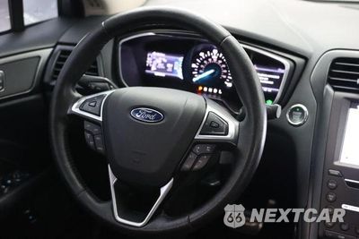 Zdjęcie 33 z 49 samochodu: 2017 FORD FUSION TITANIUM PHEV VIN:3FA6P0SU6HR152176 - miniatura