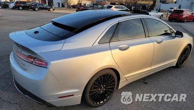 Trzecie zdjęcie samochodu z tyłu: 2017 LINCOLN MKZ RESERVE VIN:3LN6L5E90HR610946 - miniatura