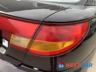 Zdjęcie 14 z 24 samochodu: 1999 SATURN SC1 VIN:1G8ZP1283XZ324457 - miniatura