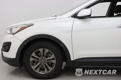 Zdjęcie 12 z 48 samochodu: 2014 HYUNDAI SANTA FE SPORT VIN:5XYZT3LB0EG203484 - miniatura