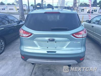 Czwarte zdjęcie samochodu z boku: 2013 FORD ESCAPE SE VIN:1FMCU0GX1DUC41774 - miniatura