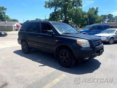 Zdjęcie 7 z 16 samochodu: 2006 HONDA PILOT EX VIN:2HKYF18746H546028 - miniatura