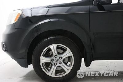 Zdjęcie 18 z 49 samochodu: 2014 HONDA PILOT EXLN VIN:5FNYF3H70EB002103 - miniatura