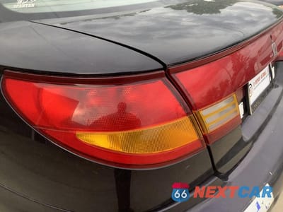 Zdjęcie 13 z 24 samochodu: 1999 SATURN SC1 VIN:1G8ZP1283XZ324457 - miniatura