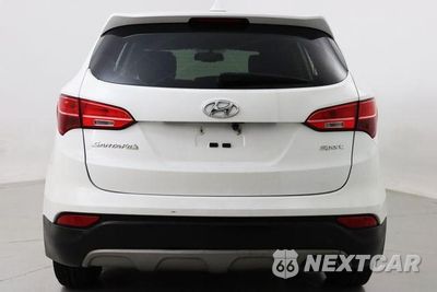Czwarte zdjęcie samochodu z boku: 2014 HYUNDAI SANTA FE SPORT VIN:5XYZT3LB0EG203484 - miniatura