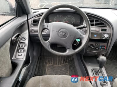 Zdjęcie 9 z 10 samochodu: 2003 HYUNDAI ELANTRA GLS VIN:KMHDN45D03U667861 - miniatura