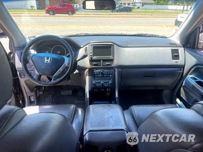 Zdjęcie 14 z 16 samochodu: 2006 HONDA PILOT EX VIN:2HKYF18746H546028 - miniatura