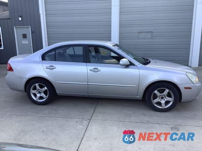 Zdjęcie 8 z 21 samochodu: 2008 KIA OPTIMA LX VIN:KNAGE123685244678 - miniatura