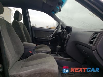 Piąte zdjęcie samochodu w środku: 2003 HYUNDAI ELANTRA GLS VIN:KMHDN45D03U667861 - miniatura