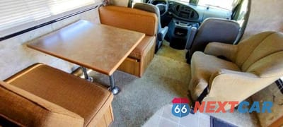 Zdjęcie 7 z 7 samochodu: 2003 FORD E-450 COAC VIN:1FDXE45583HB42938 - miniatura