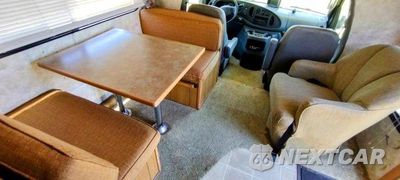 Zdjęcie 7 z 7 samochodu: 2003 FORD E-450 COAC VIN:1FDXE45583HB42938 - miniatura