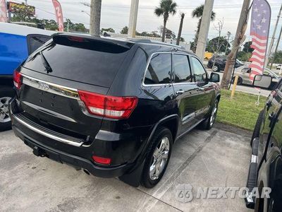 Czwarte zdjęcie samochodu z boku: 2011 JEEP GRAND CHEROKEE OVERLAND VIN:1J4RR6GG5BC679598 - miniatura
