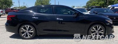 Czwarte zdjęcie samochodu z boku: 2016 NISSAN MAXIMA 3.5S VIN:1N4AA6AP0GC405063 - miniatura