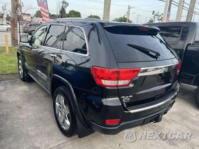 Piąte zdjęcie samochodu w środku: 2011 JEEP GRAND CHEROKEE OVERLAND VIN:1J4RR6GG5BC679598 - miniatura