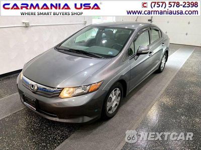 Czwarte zdjęcie samochodu z boku: 2012 HONDA CIVIC HYBRID VIN:JHMFB4F20CS011382 - miniatura